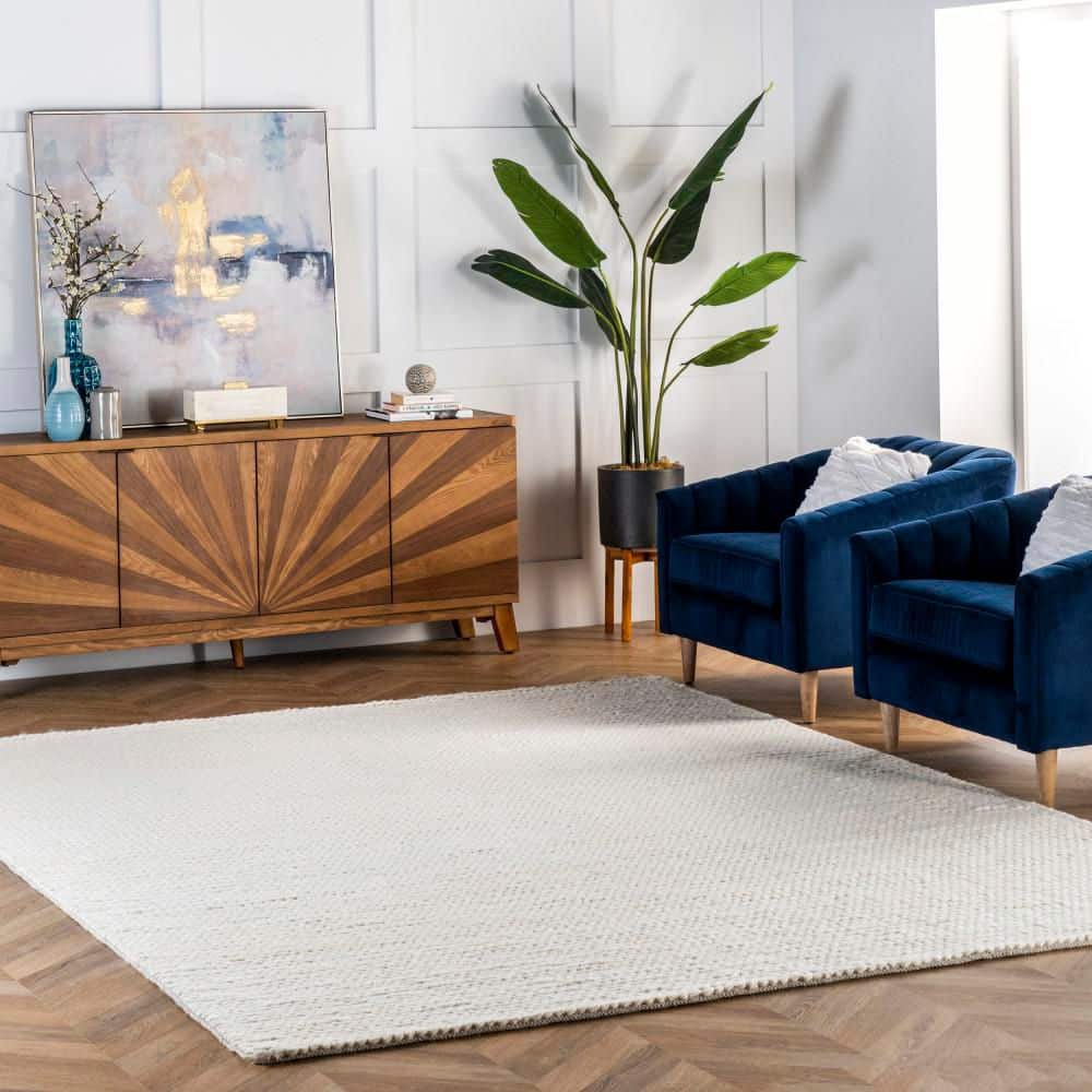 Handmade Off-White Braided Wool 4' x 6' Area Rug