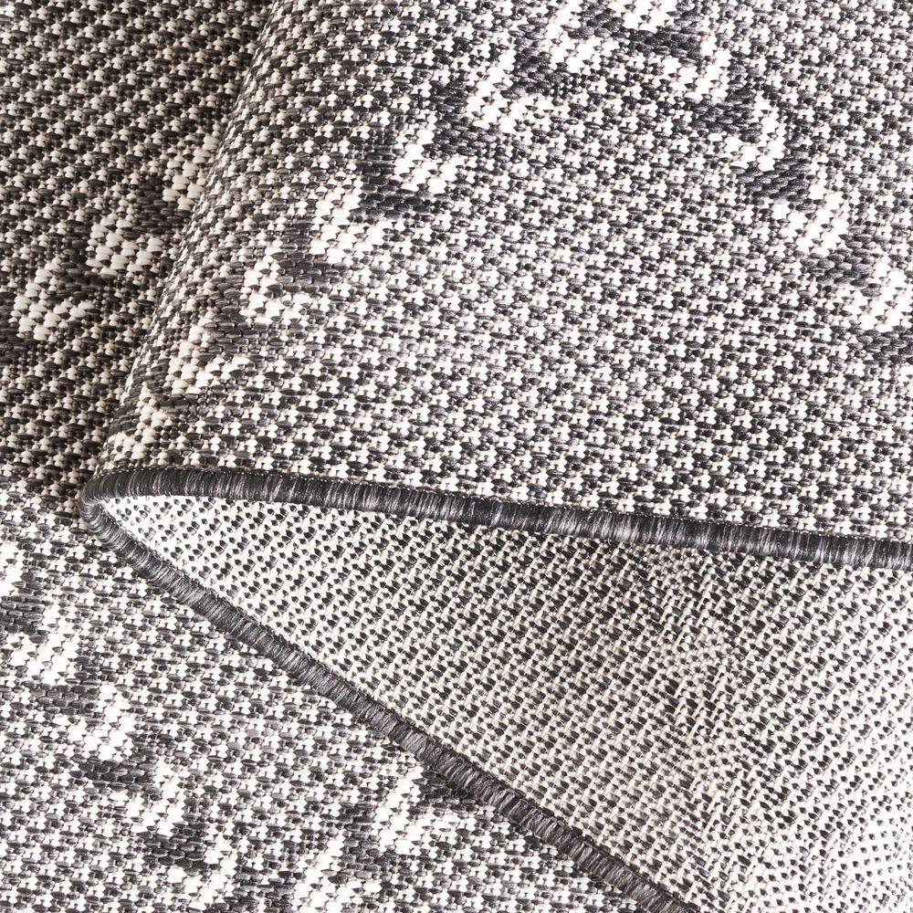 Percival Black and Ivory Geometric 8' x 10' Synthetic Area Rug