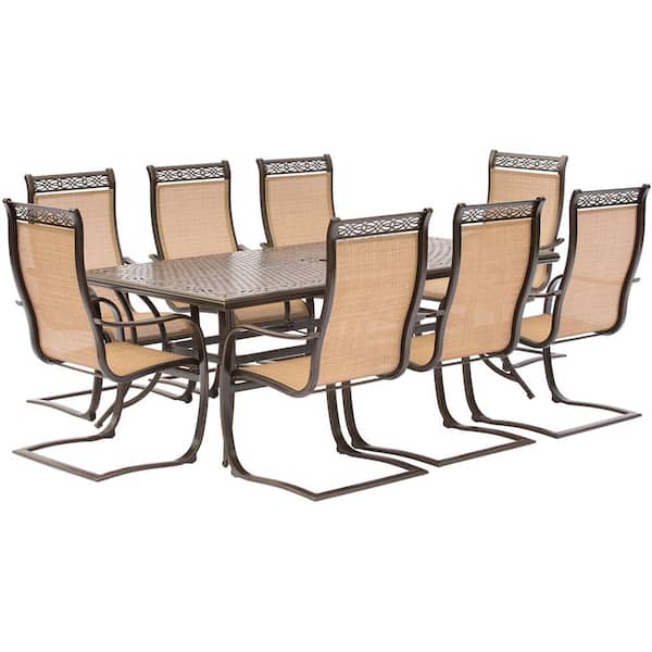 Hanover Manor 9-Piece Aluminum Rectangular Outdoor Dining Set with Spring Sling Chairs and Cast-Top Table