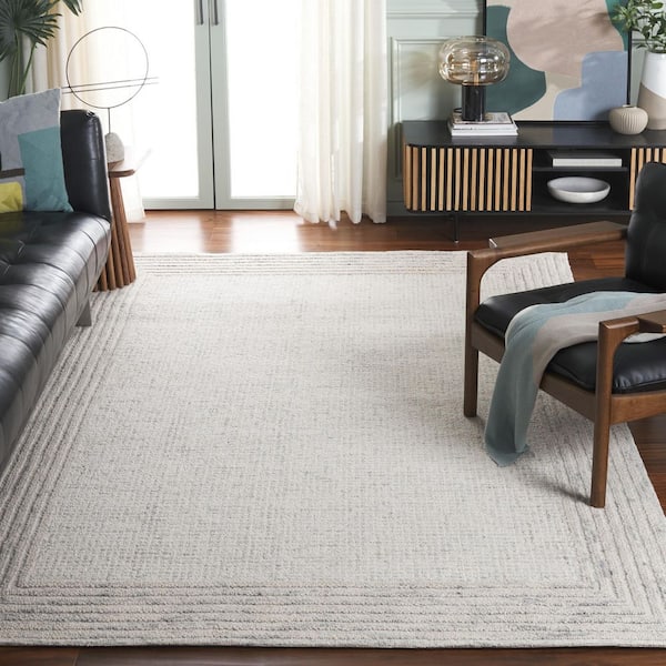 Ebony 6 ft. x 9 ft. Denim/Gray Solid Striped Border Area Rug