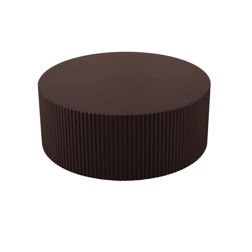 Three-quarter view of a round brown coffee table with a fluted base on a white background.