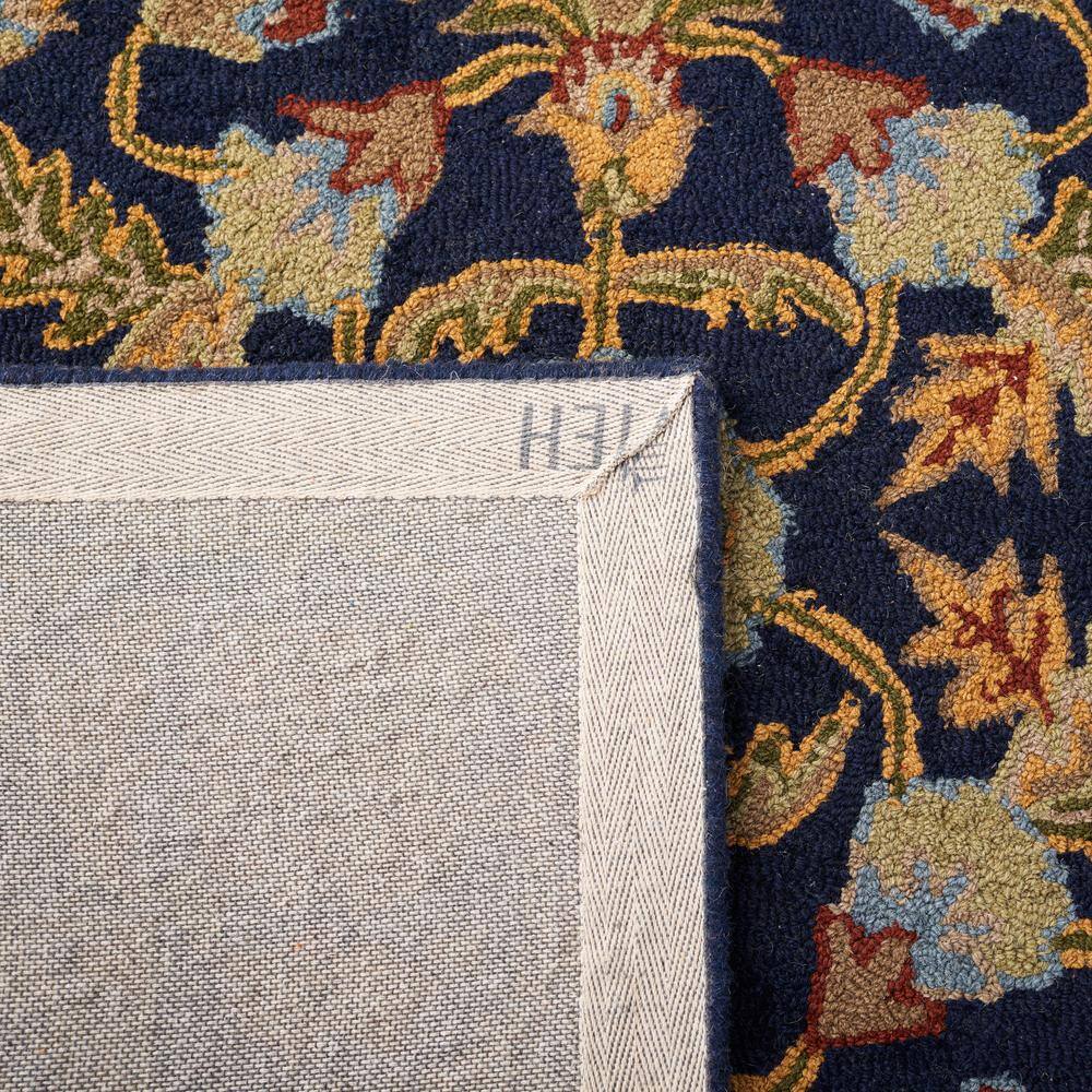 Handmade Tufted Blue Wool Floral 5' x 8' Area Rug