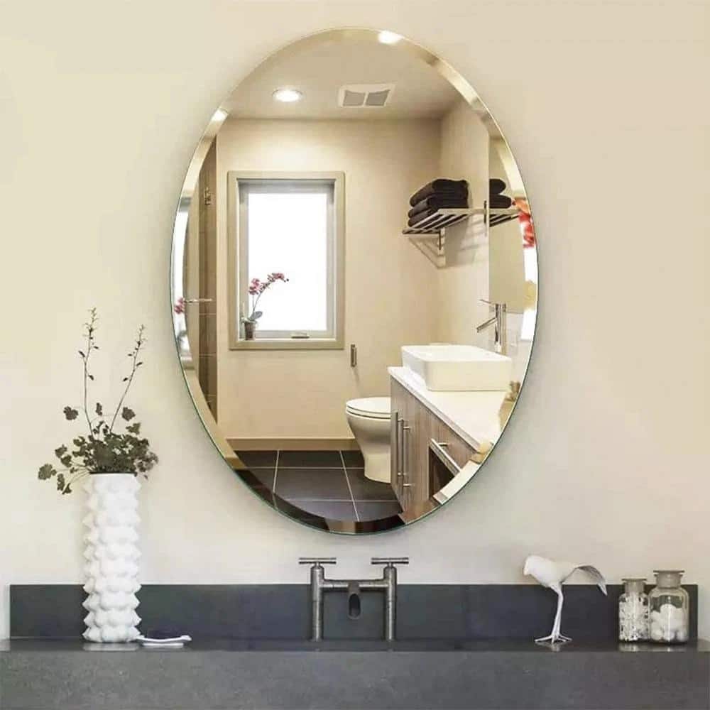 Elegant Oval 22" x 39" Frameless Polished Wall Mirror with Beveled Edge