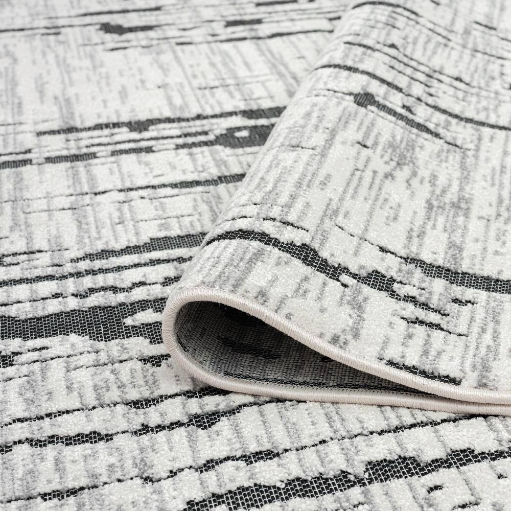 Contemporary Black Stripe Polypropylene 5'3" x 7'3" Outdoor Rug