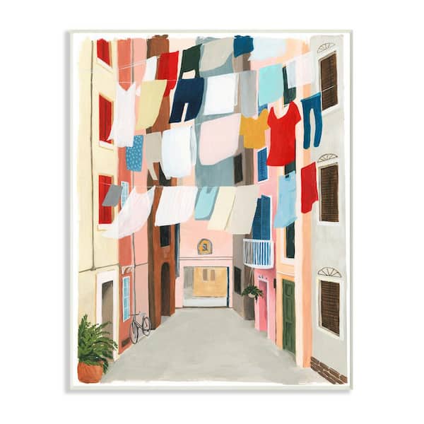 Stupell Industries 12.5 in. x 18.5 in. "Colorful Laundry Day Clothes Line Between Apartments" by Grace Popp Wood Wall Art