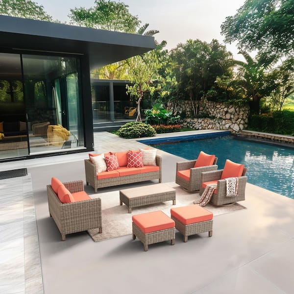 7-Piece Wicker Outdoor Patio Conversation Set with Orange Cushions and Swivel Rocking Chairs