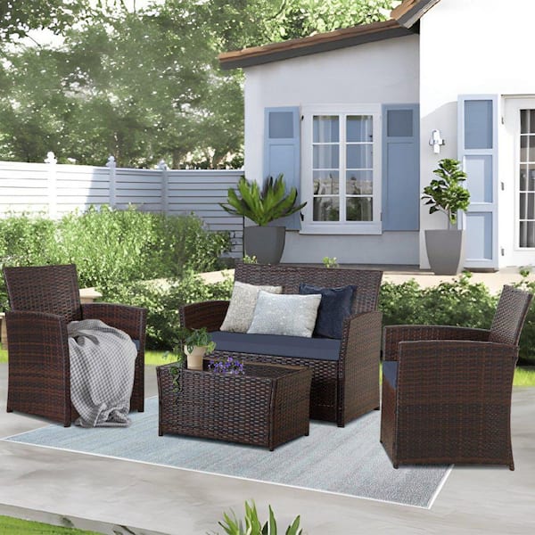 Unbranded 4-Piece Wicker Outdoor Dining Set with Washed Blue Cushion