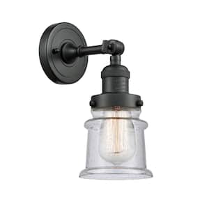 Franklin Restoration Small Canton 5.25 in. 1-Light Matte Black Wall Sconce with Seedy Glass Shade