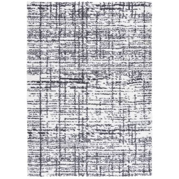 Rumi Shag 8 ft. x 10 ft. Charcoal/Ivory Distressed Area Rug