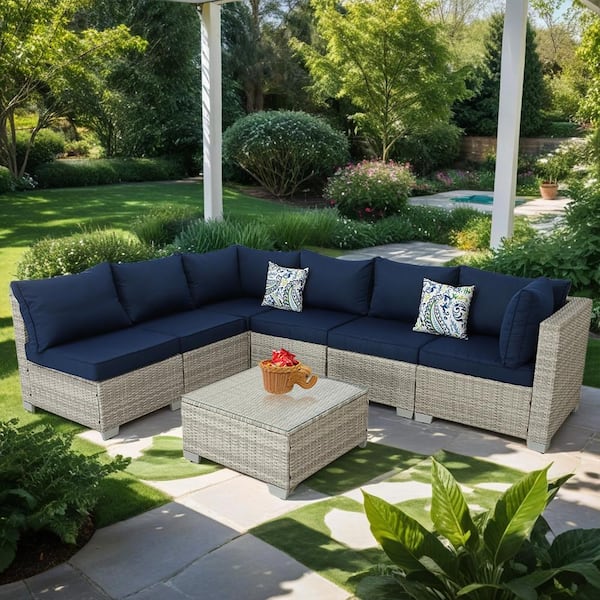 Zeus & Ruta 7-Piece Gray White Wicker Patio Outdoor Sectional Sofa with Coffee Table and Dark blue Cushions
