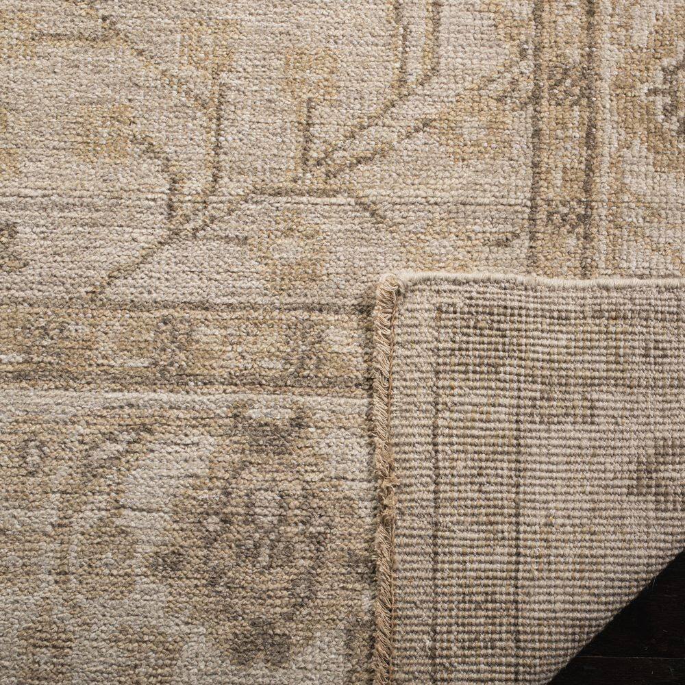 Izmir Gold and Ivory Hand-Knotted Wool 6' x 9' Area Rug