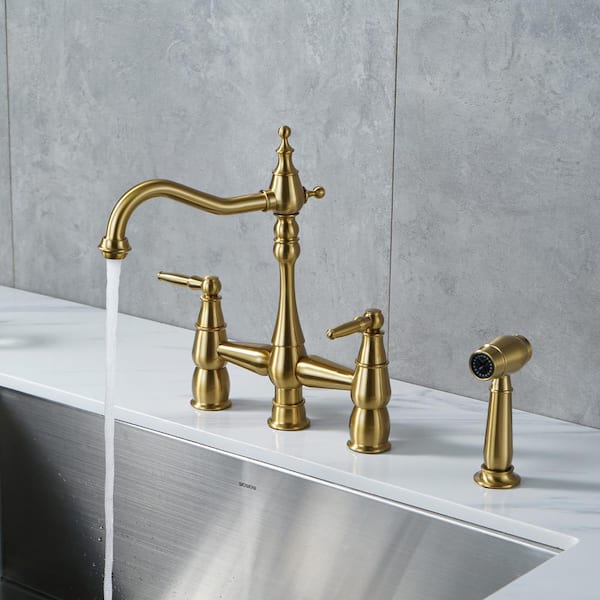 4 Hole Double Handle Bridge Kitchen Faucet with Side Sprayer Deck Mount in Gold