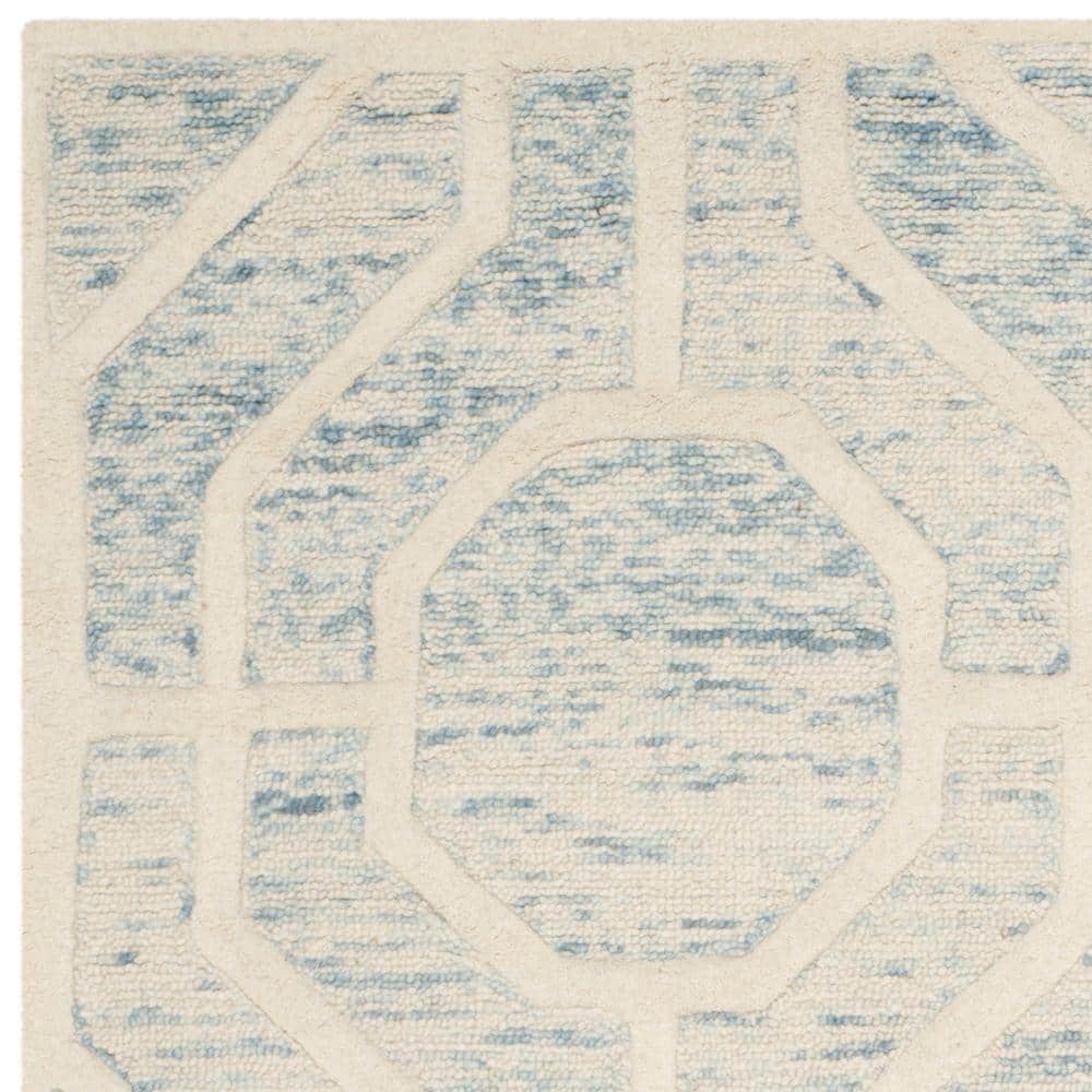 Handmade Tufted Blue and Ivory Wool Area Rug