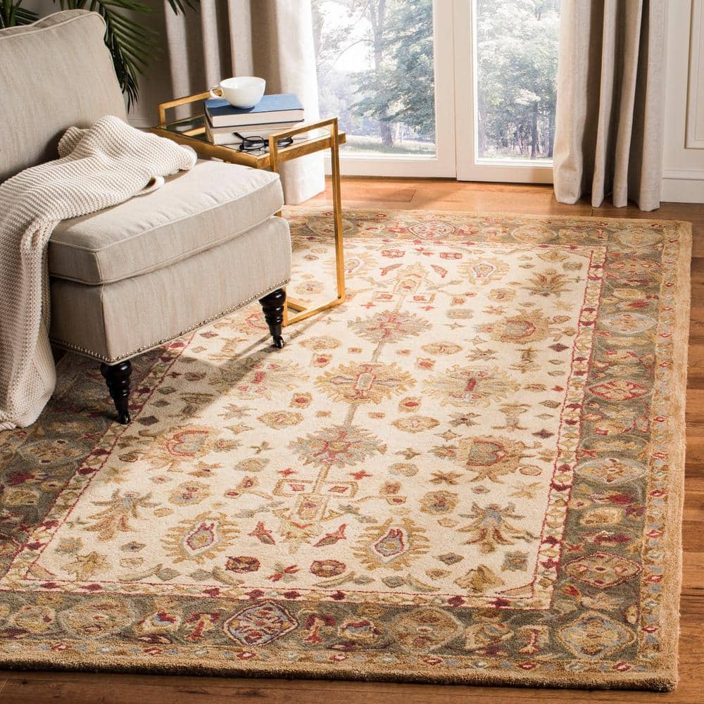 Ivory and Green Handmade Wool Tufted 8' x 10' Area Rug