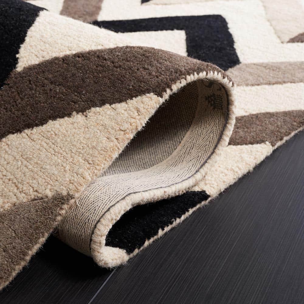 Ivory and Black Hand-Tufted Wool 6' x 9' Rectangular Area Rug