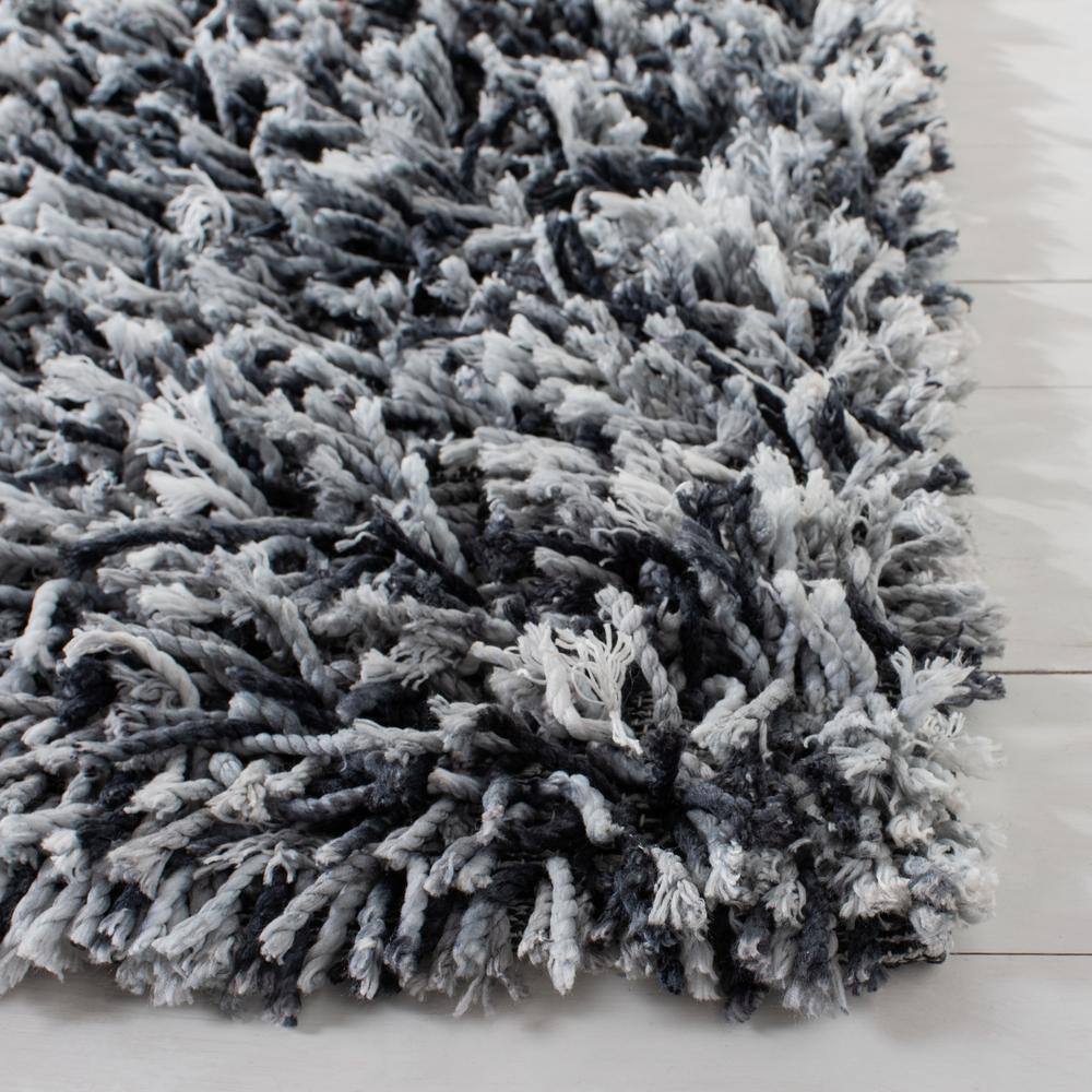 Handmade Black and Ivory Synthetic Shag Rug, 6' x 9'
