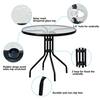 Outdoor dining table with callouts for glass top, umbrella hole, rubber plugs, and non-slip feet.