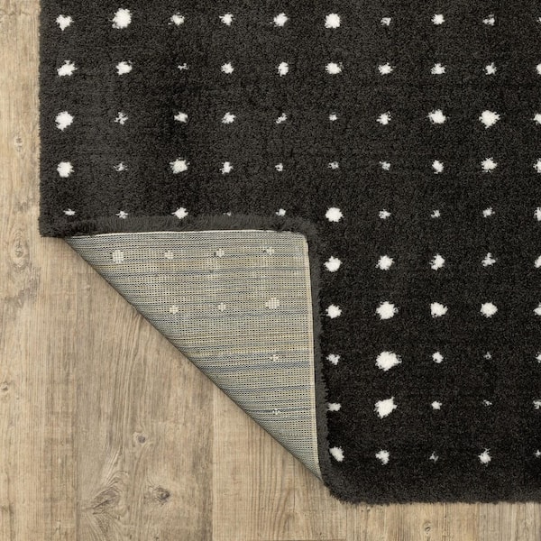 5' X 8' Beige Floral Area Rug With Fringe