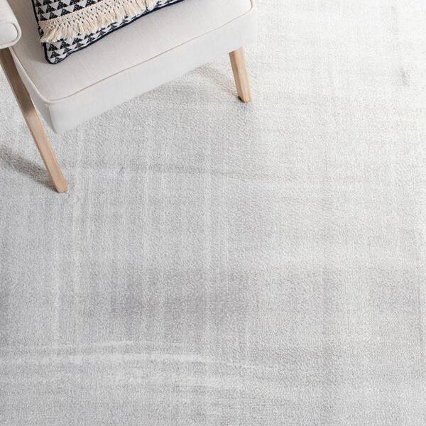 SAFAVIEH Skyler 5 ft. x 8 ft. Gray/Ivory Distressed Overdyed Area