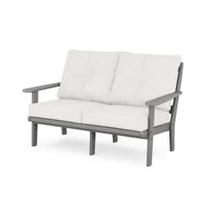 Cape Cod Deep Seating Plastic Outdoor Loveseat with in Stepping Stone/Natural Linen Cushions