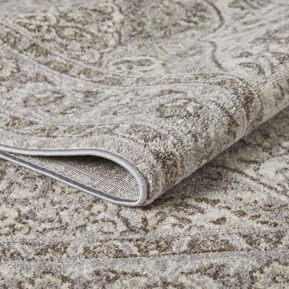 Gray and Beige 4' x 6' Oriental Synthetic Area Rug
