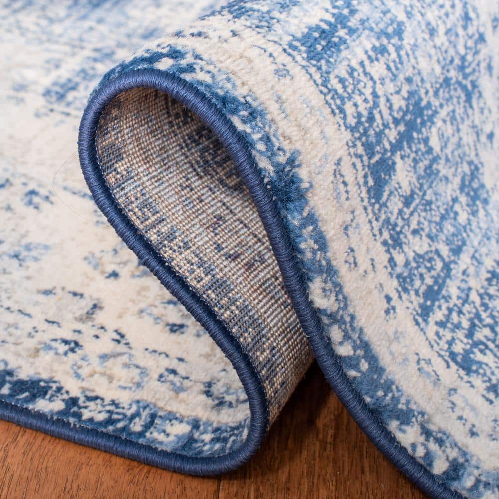 Ivory and Navy Synthetic Hand-knotted Rectangular Area Rug