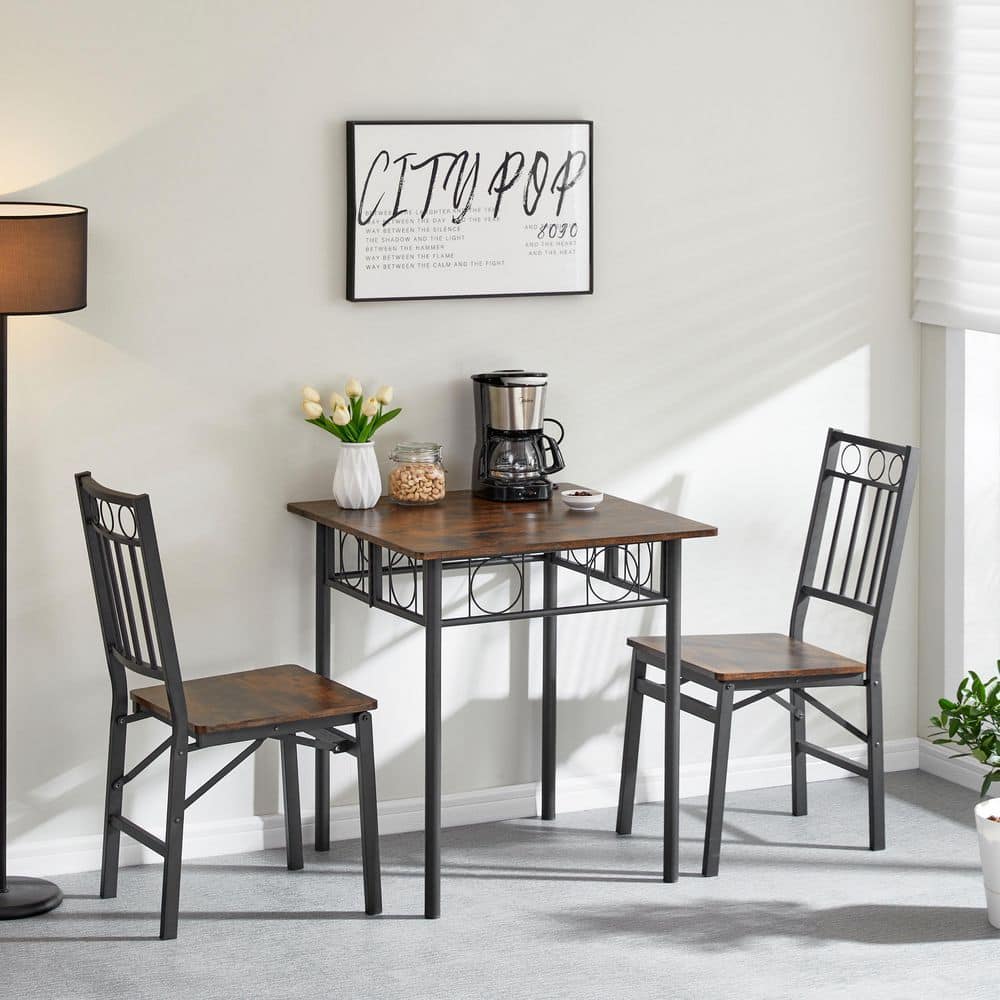 Industrial square dining table with two matching chairs in a room.