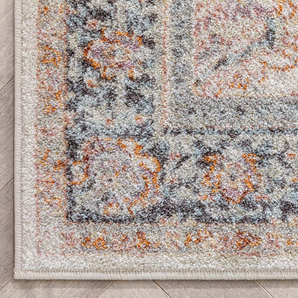 Ivory Floral Synthetic Reversible 5' x 7' Area Rug