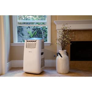 8,500 BTU Portable Air Conditioner Cools 500 Sq. Ft. with Heater and Easy Window Venting Kit in White