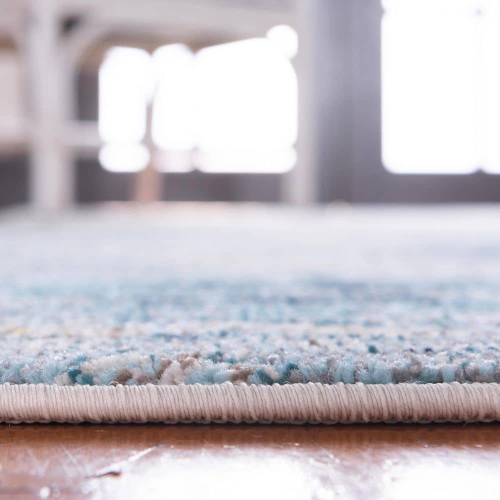 Luminous Light Blue Abstract Synthetic Indoor Rug, 10' 6" x 16' 5"