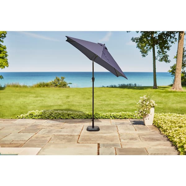 belham living 9-ft sunbrella deluxe-tilt aluminum patio umbrella Hampton Bay 9 ft. Aluminum Patio Umbrella in Midnight with Tilt  9900-01297011