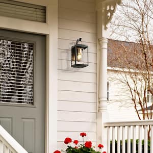 Modern 13.2 in. 1-Light Black and Gold Outdoor Wall Light with Cylinder Clear Glass Shade for Patio, Garage, and Doorway