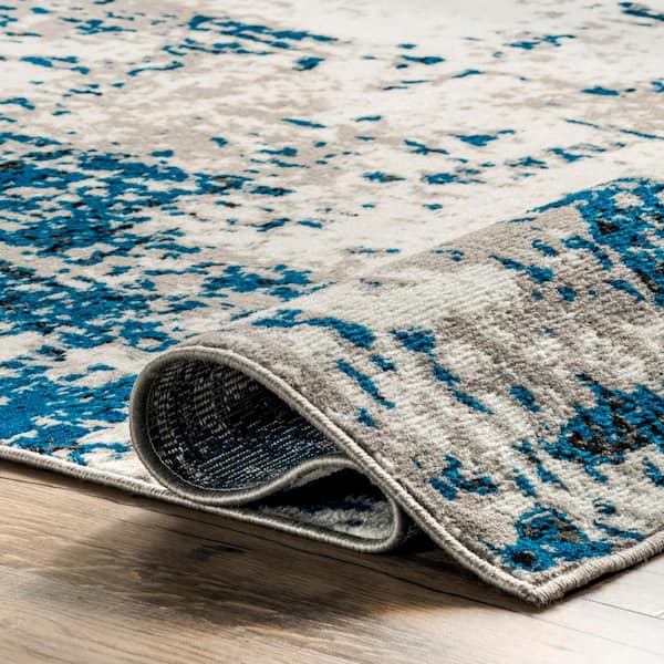 https://images.thdstatic.com/productImages/5ce7d347-d47b-5fc0-ae1a-e4530dd5dfea/svn/blue-nuloom-area-rugs-gvtp02a-9012-1f_600.jpg