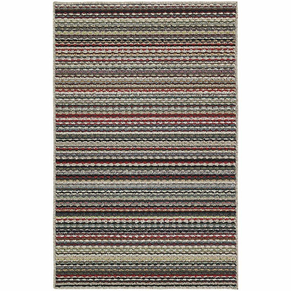 Garland Rug Carnival Stripe Random Multi 3 ft. x 5 ft. Area Rug, Earthtone Stripe Multi The Garland Rug 3 ft. x 5 ft. Area Rug adds style and warmth to any room. With a striped motif, this tufted rug creates the illusion of extra space in your home. It is multi-colored, so you can vividly decorate your flooring with a multitude of colors. It has a 100% olefin design, making it a durable option with remarkable longevity. Color: Earthtone Stripe Multi.