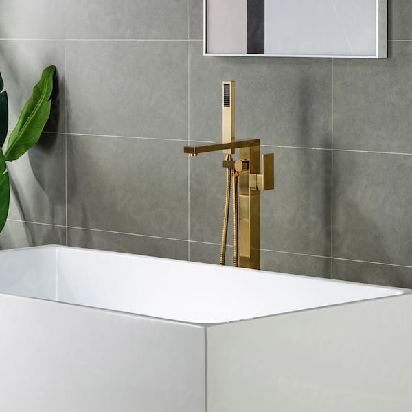 https://images.thdstatic.com/productImages/5d02d970-960d-4166-8a24-ad73952469a1/svn/brushed-gold-woodbridge-claw-foot-tub-faucets-f0008bg-77_600.jpg