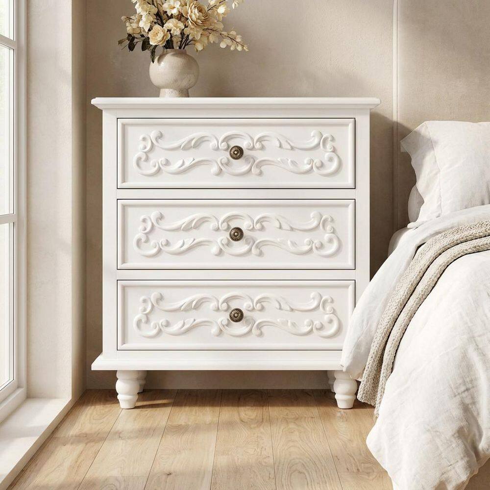 White 3 Drawer 23.6 in. W Nightstand with Carved Accent Drawer Fronts, Solid Wood Legs, Round Knobs