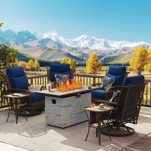 7-Piece Patio Fire Pit Set with 5 in. Blue Cushions Swivel Rocking Chairs and Gray Faux Stone Gas Fire Table for Deck