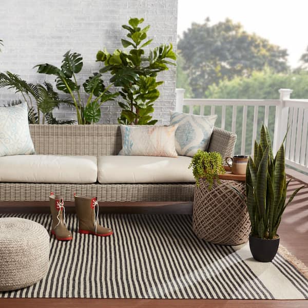 https://images.thdstatic.com/productImages/5d218c08-d6a8-44f2-a9da-4038de7d3f52/svn/dark-gray-beige-jaipur-living-outdoor-rugs-rug150101-fa_600.jpg