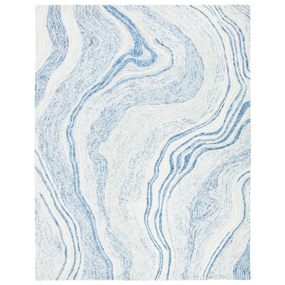 Handmade Blue and Ivory Wool Abstract Area Rug