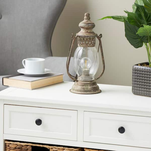 Litton Lane 17 in. Bronze Metal Distressed Antique Style Lantern Task and Reading Table Lamp