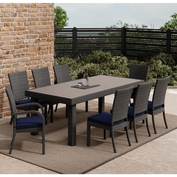 9-Piece Brown Wicker Outdoor Dining Set with Navy Blue Cushions, Rectangular Table with PS Wood Top, Seats 8