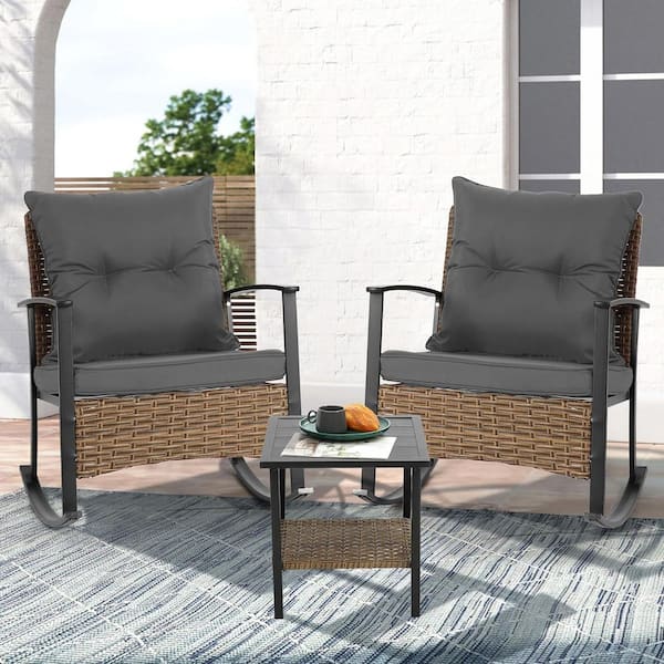 3-Piece Wicker Outdoor Bistro Furniture Set Rocking Chair Set with Dark Grey Cushions and 2-Tier Coffee Table