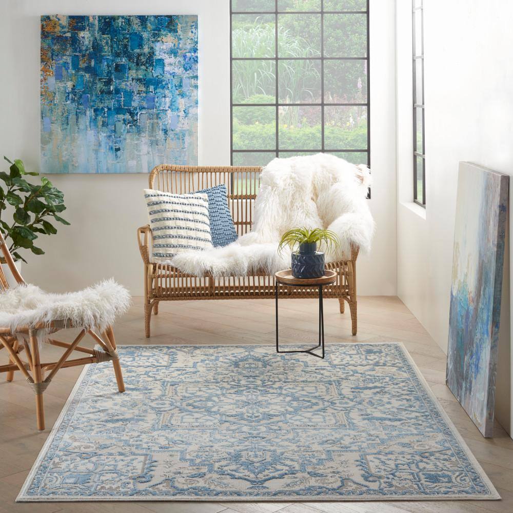 Ivory Blue Floral Synthetic 5' x 7' Rectangular Rug