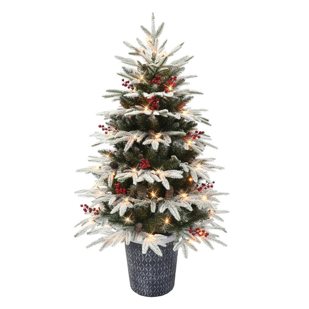 Puleo International 4.5 ft. Prelit Potted Flocked Fir Artificial Christmas Tree 70 UL Clear