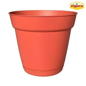 8 in. Bea Small Orange Resin Planter (8 in. D x 7.1 in. H) With Drainage Hole and Attached Saucer