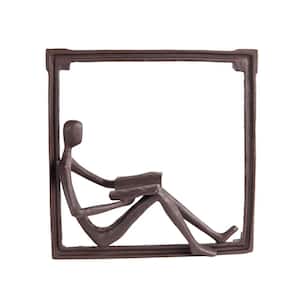 9 in. Man Reading on a Window Sill Hanging Wall Art Iron Sculpture
