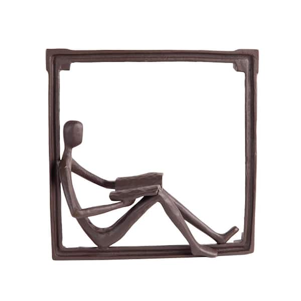 DANYA B 9 in. Man Reading on a Window Sill Hanging Wall Art Iron Sculpture
