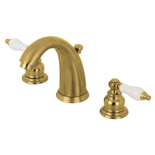 Kingston Brass Victorian 2-Handle 8 in. Widespread Bathroom Faucets with Plastic Pop-Up in Brushed Brass
