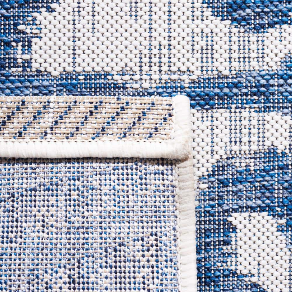 Ivory and Navy Square Stain-Resistant Cotton Outdoor Rug