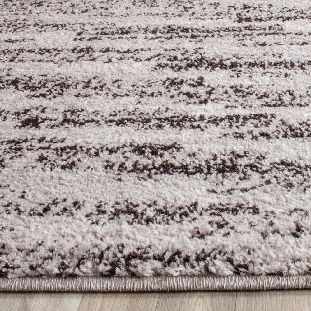 Adirondack Black and Silver Striped Synthetic Area Rug
